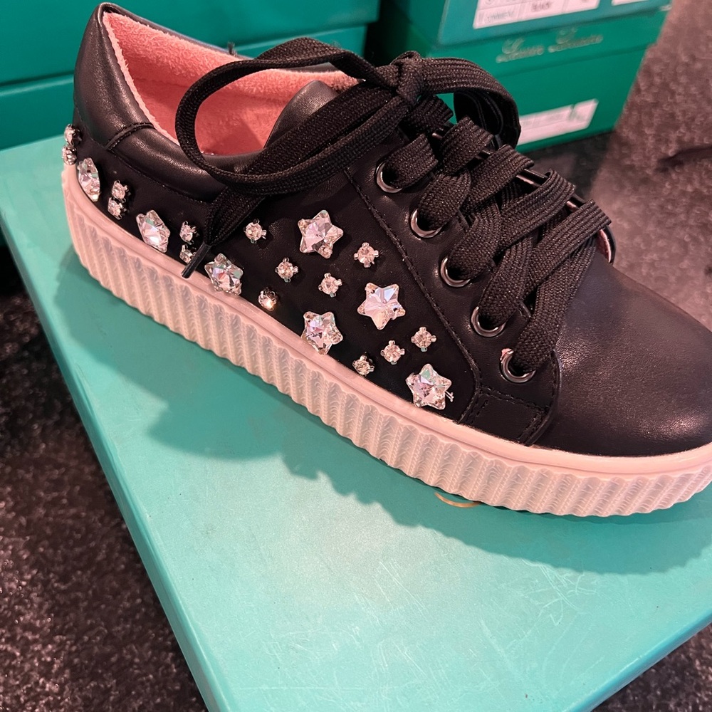 Lauren Lorraine Black Sneakers with Star Embellishments